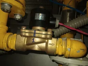 Gas pre-treatment system for textile weaving